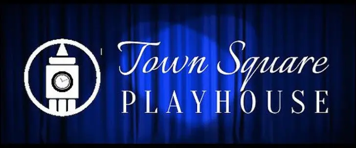 A blue curtain with the words town square playhouse in front of it.