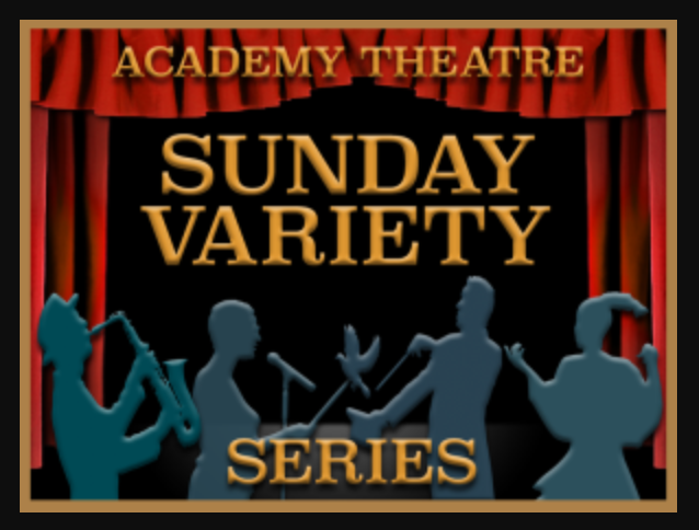 A group of people standing on top of a stage.