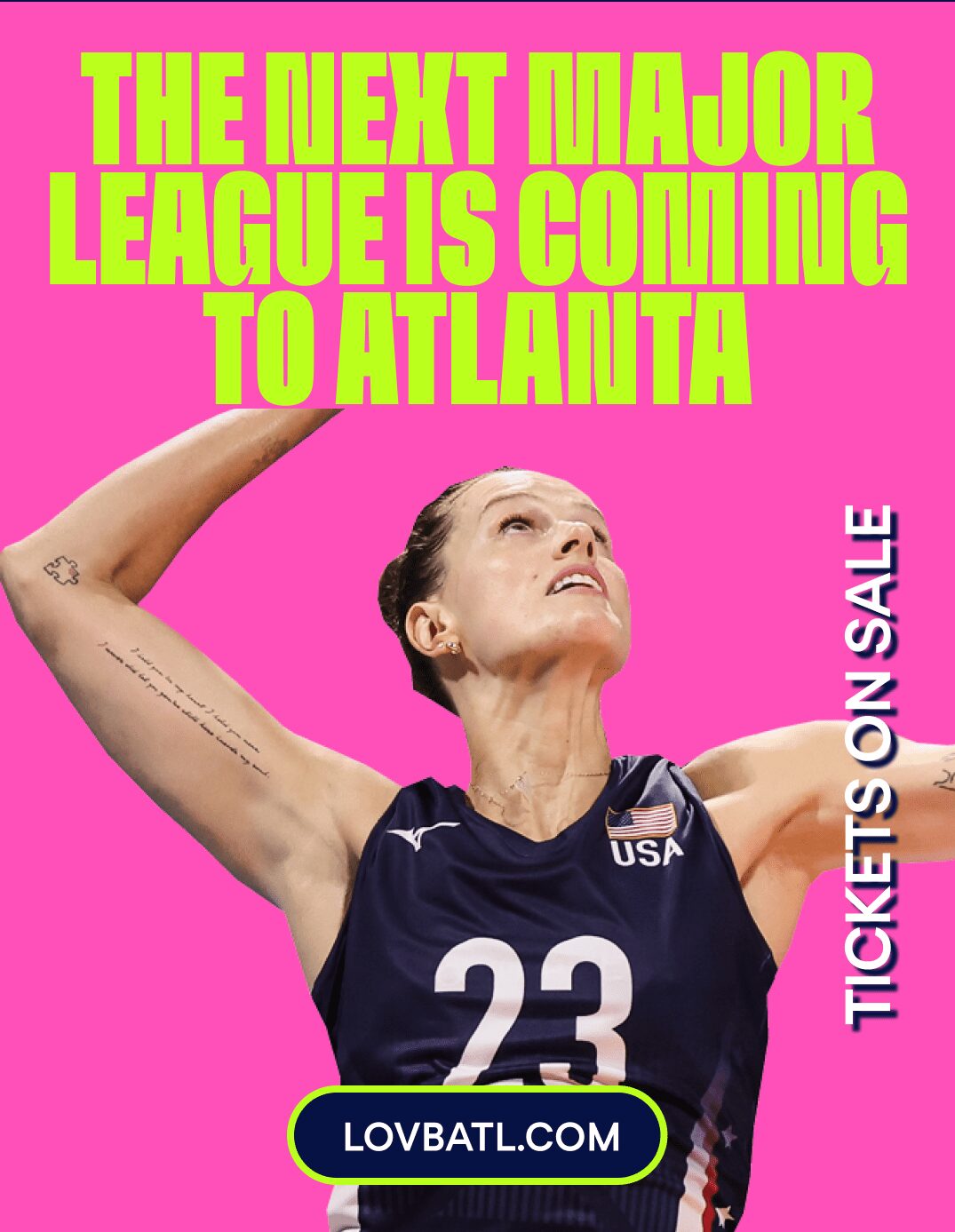 USA volleyball player reaching up to spike
