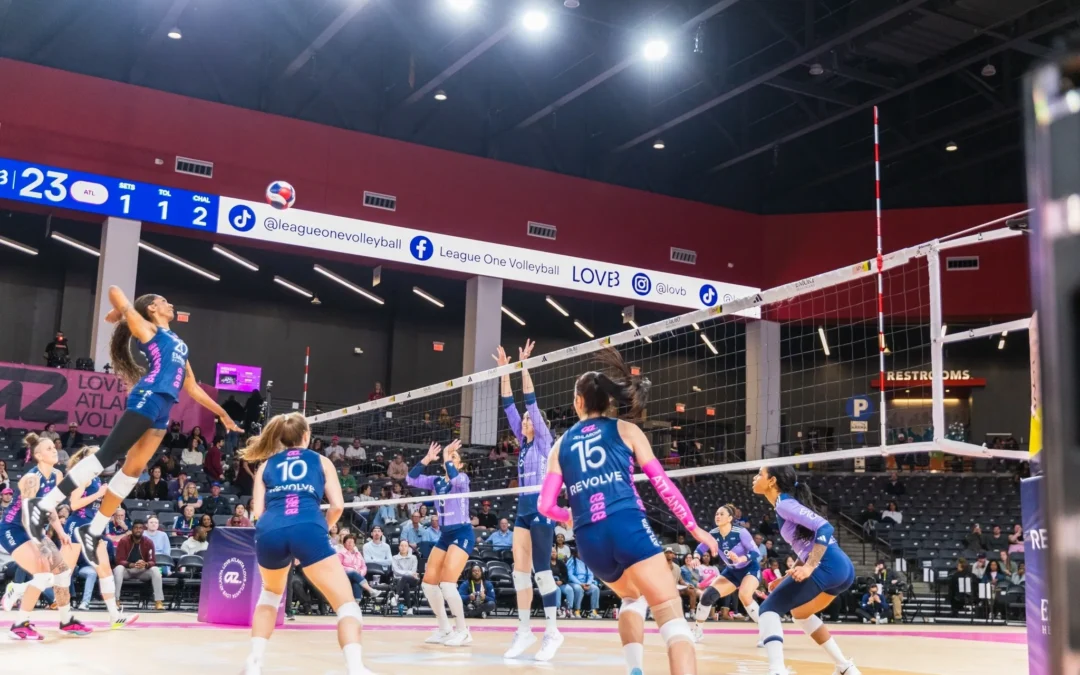 Women's volleyball match in action.